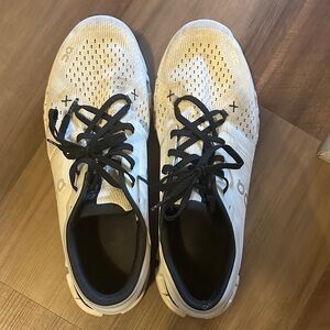 On Running Men's Athletic Shoes in White and Black